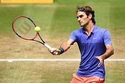 TV commentator Matthias Stach hits an outrageous tweener against Roger Federer
