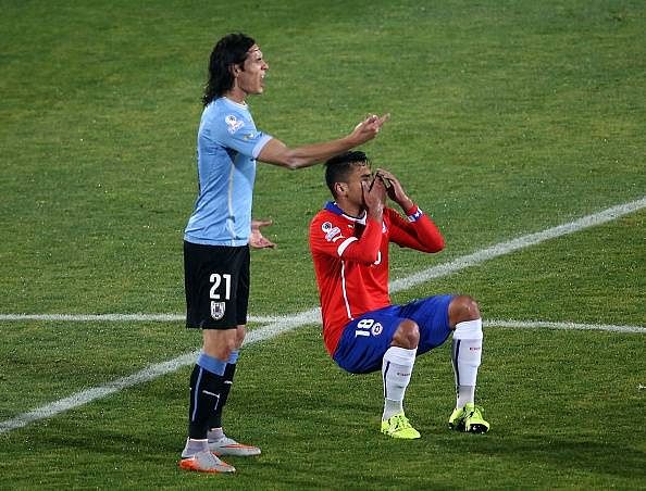 Copa America: Chile's Gonzalo Jara banned for inappropriately touching Uruguay's Edinson Cavani