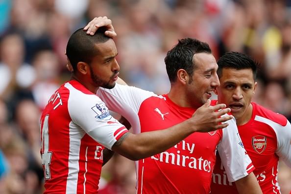 Theo Walcott and Santi Cazorla extend Arsenal contracts