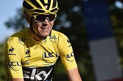 Chris Froome wins 2015 Tour de France; Drinks champagne on bike 100km before finish line