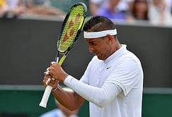 Nick Kyrgios courts controversy in Wimbledon loss, accused of tanking