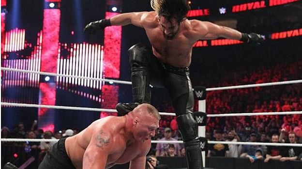 Seth Rollins curb stomping Brock Lesnar at Royal Rumble PPV 2015