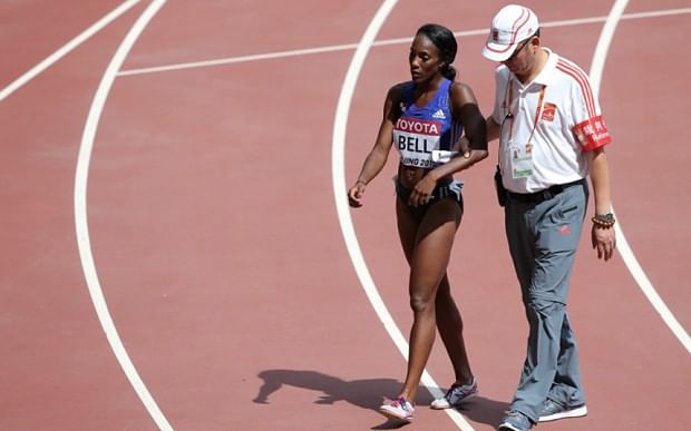Video: Rolanda Bell falls head first into the water in the 3000m steeplechase