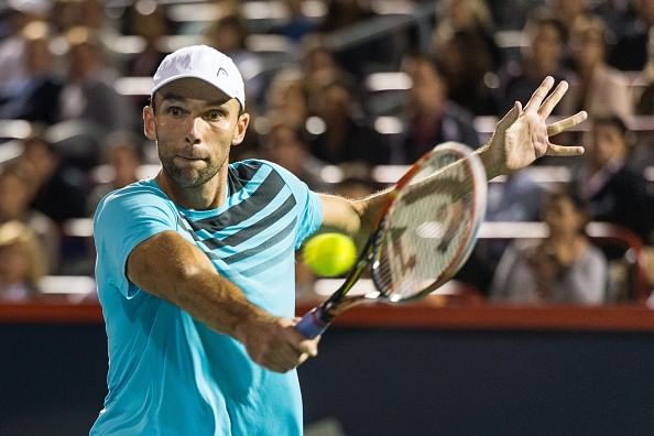 Cincinnati Masters: Ivo Karlovic beats Gilles Simon in the first round