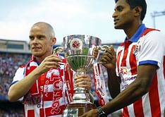 Atletico de Kolkata showcase the Indian Super League trophy to Atletico de Madrid fans