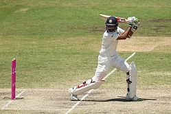 Bhuvneshwar Kumar - India's Cheteshwar Pujara with the ball