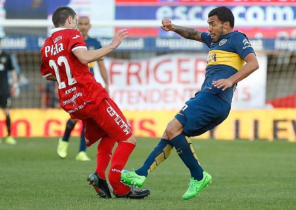 Video: Carlos Tevez scores brace, then breaks Ezequiel Ham's leg in unfortunate challenge