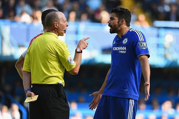 Referee Mike Dean Diego Costa Gabriel Chelsea Arsenal