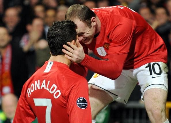 Kai Rooney dons a Cristiano Ronaldo Real Madrid kit before Manchester Derby