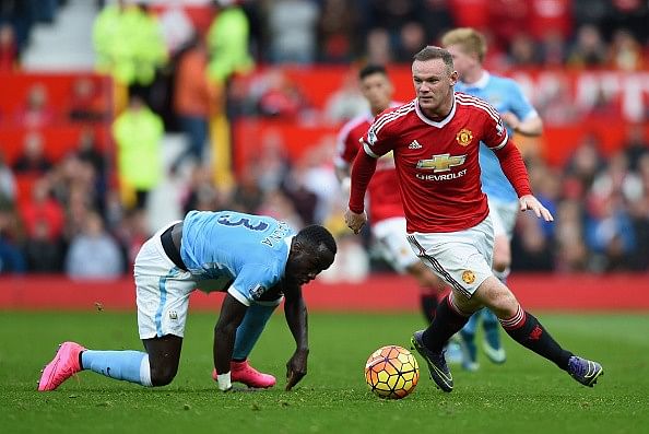 Xavi believes Wayne Rooney should operate from a deeper role in order to extend his career