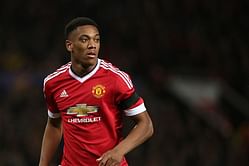 Manchester United's Anthony Martial leaves Wembley on crutches