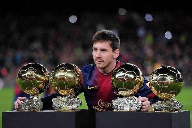 Lionel Messi with his 4 Ballon d&#039;Or awards