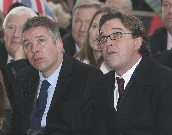 Sir Alex and his son Jason(L) were cleared of any sort of wrongdoings by the club