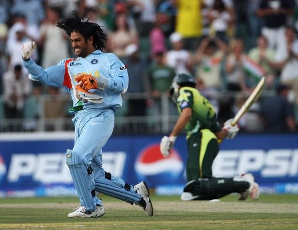 Dhoni (L) celebrating the moment that India won the first-ever T20 World Cup