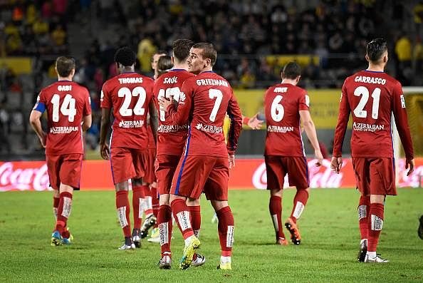 Atletico Madrid remain top of La Liga while Barcelona and Real Madrid enjoy easy wins