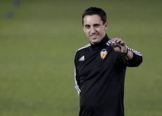 Valencia's Neville staying calm in 'eye of the storm'
