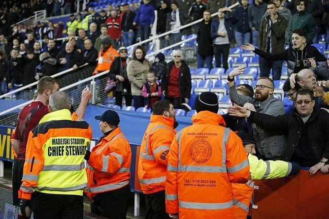 Wenger labels coin-throwing fans a disgrace
