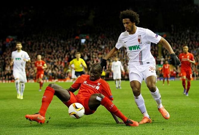 Liverpool through with nervy win, perfect 10 for Valencia