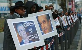 Pro-Salman supporters greet delegates at FIFA Congress