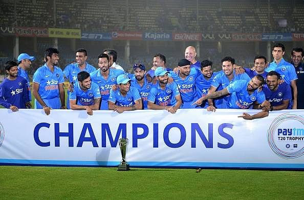 victorious Indian team pose with the trophy
