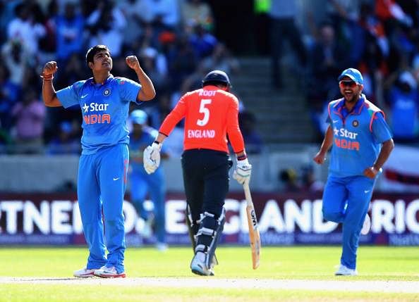 Karn Sharma celebrates a wicket