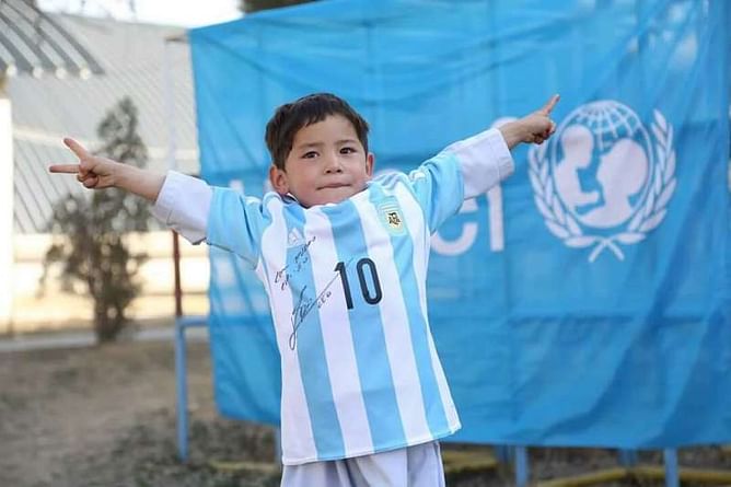Afghan boy wearing Messi jersey made of plastic bag finally gets a real kit from the Barcelona star