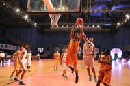 Mumbai Challengers' Raj Kalbhor grabs a rebound over Haryana Gold's Vikas Kumar UBA United Basketball Alliance