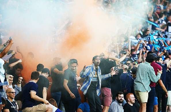 A-League: Football fans let off flares, Australian police threaten lockout at Melbourne venues