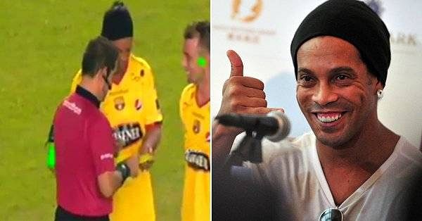 Ronaldinho gives autograph to referee on a 'yellow card'