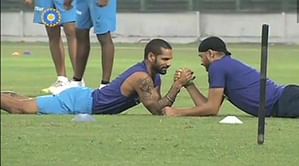 Video: Watch Shikhar Dhawan and Harbhajan Singh go head-to-head in an arm-wrestling match
