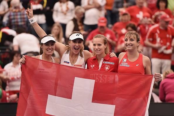 Belinda Bencic and Martina Hingis lead Switzerland into the Fed Cup semi-final