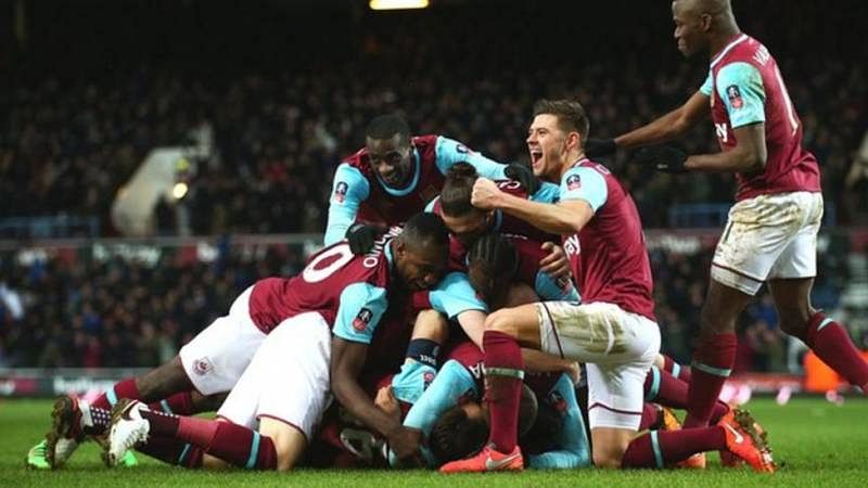 West Ham players celebrate after scoring