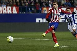 Atletico win 3-0 to close gap to Barcelona