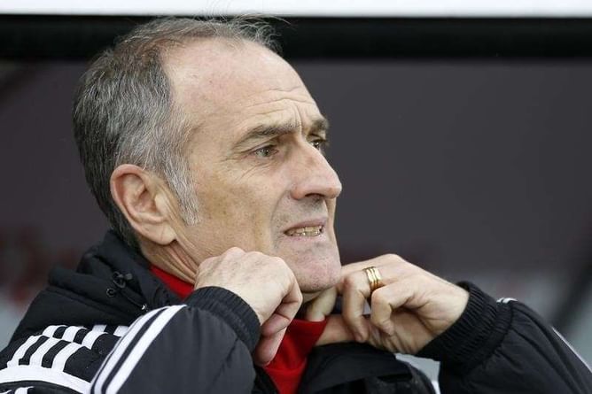 Swansea boss Guidolin still in hospital