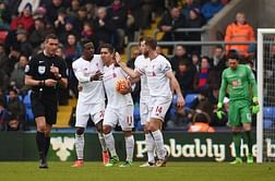 Benteke penalty seals comeback win for 10-man Liverpool