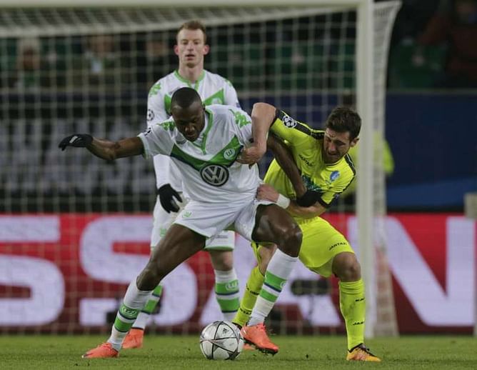 Wolfsburg reach Champions League last eight for first time