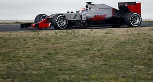 Haas fly flag for America in a grey way