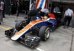 Rookie Rio Haryanto hits Romain Grosjean in pit-lane