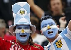 Argentina fight back for 2-1 win on Messi return