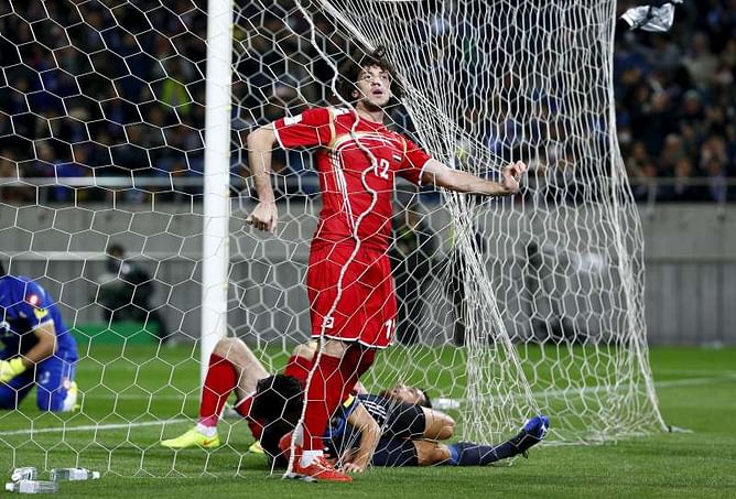 Suffering Syrians advance despite defeat by Japan