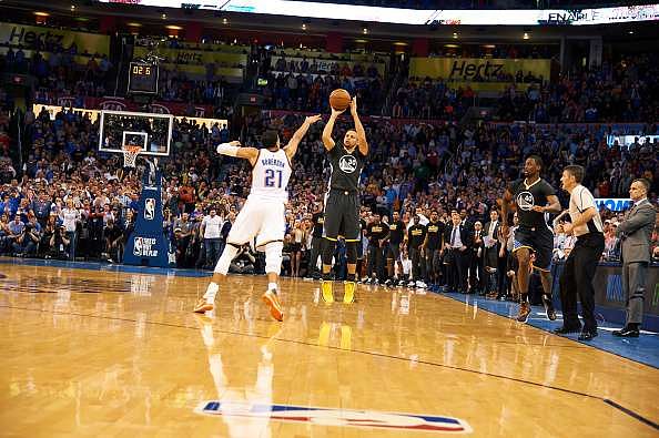 Golden State Warriors Stephen Curry (30) in action, hitting game winning three point shot in overtime vs Oklahoma City Thunder