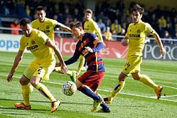 Lionel Messi's shot hits supporter in the stands during Barcelona-Villarreal game