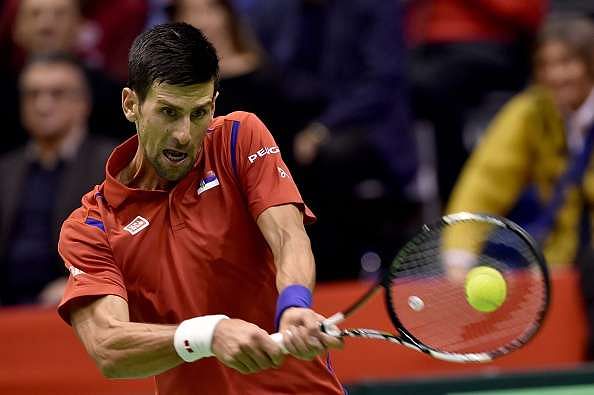 Davis Cup: Novak Djokovic finds form to delight Serbian fans in first-round clash