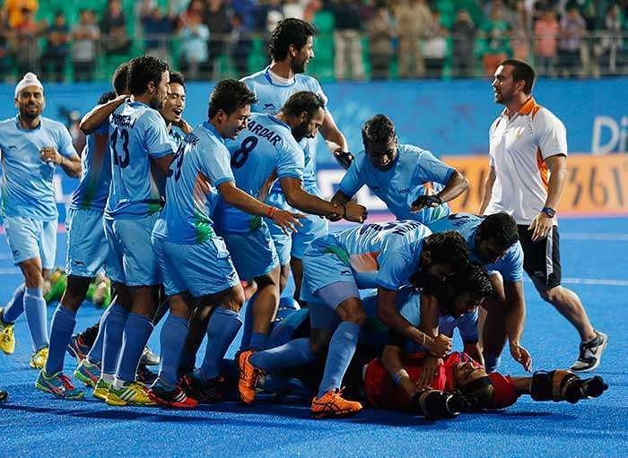 Sreejesh celebrates with the Indian team