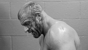 WWE News: Triple H receives head wound after Roman Reigns attack
