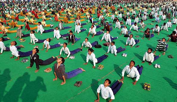 Children performing yoga