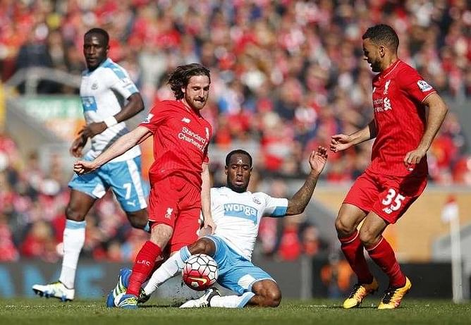 Newcastle strike back from two down to deny Liverpool