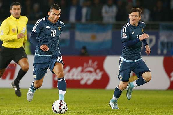Carlos Tevez says playing alongside Lionel Messi is not easy