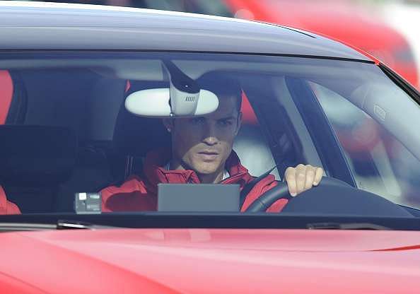 Ronaldo driving a car