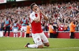 Giroud hat-trick lifts Arsenal to second
